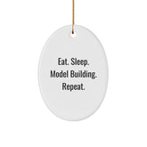 Model Building Oval Ornament Gifts from Friends for Christmas - Eat. Sleep. Model Building. Repeat. - Durable MDF Material, High-Gloss Finish, and Vibrant Colors - Image 1